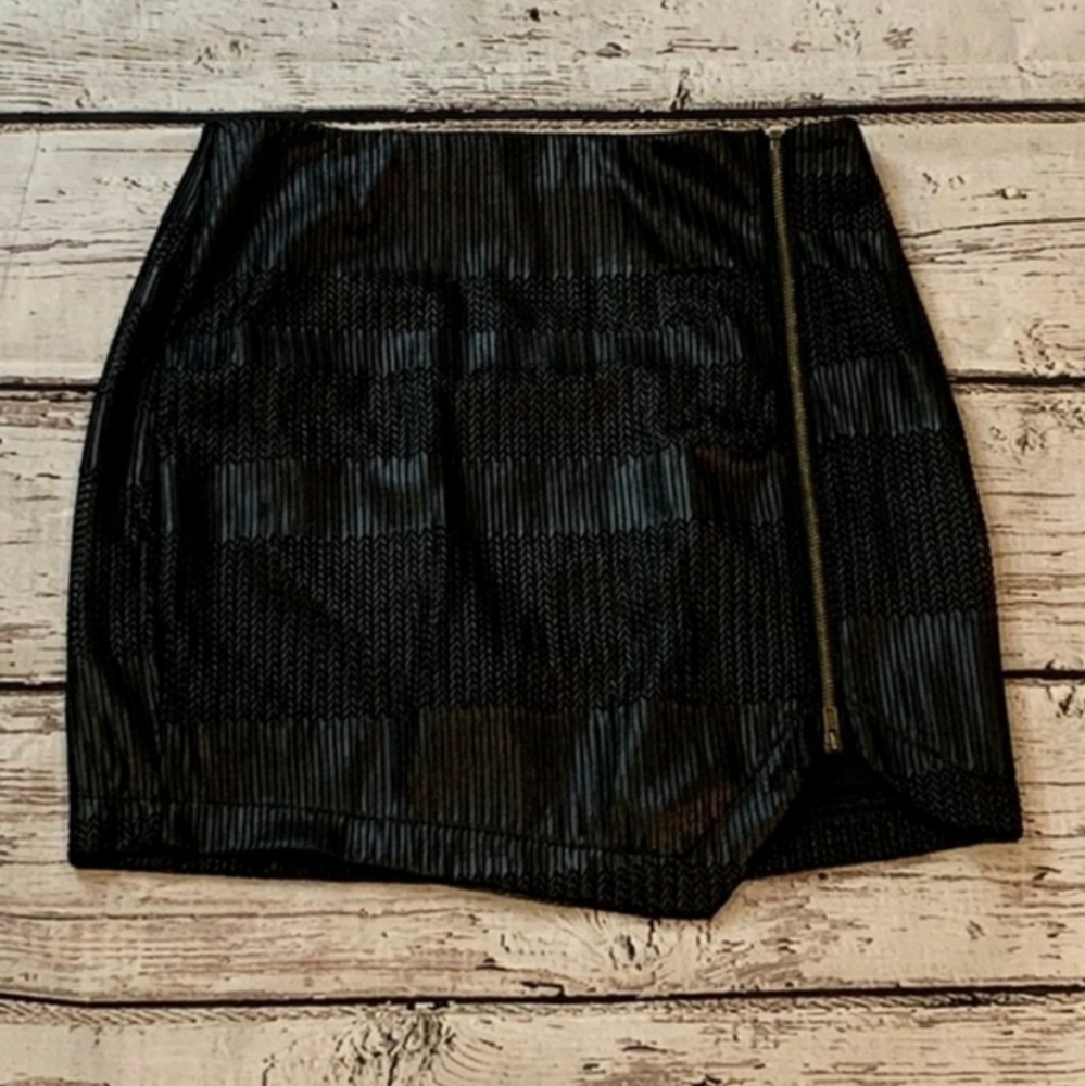 Sleek black faux leather bodycon mini skirt
